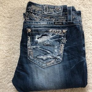 Miss Me EUC jeans. These jeans are size 31, easy, straight legs.